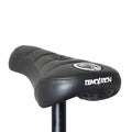 Close-up of the Demolition Matt Cordova Seat (V1) in black, featuring the "Demolition" branding on the back. This Pivotal Fat Cap design, perfect for BMX enthusiasts, offers both comfort and style for any ride.