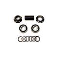 The Demolition MID Bottom Bracket set, featuring two cups, mid BB sealed bearings, a tube, and washers, is neatly displayed on a white background.