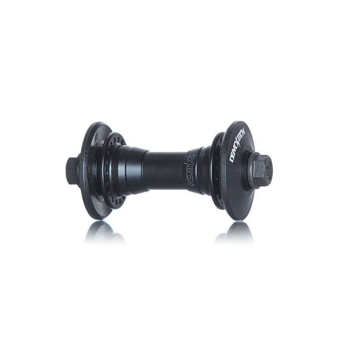 The Demolition Whistler Pro Front Hub boasts a sleek black aluminum shell with circular flanges and threaded bolts. It's enhanced with sealed Japanese bearings, ensuring durability and smooth performance for every ride.