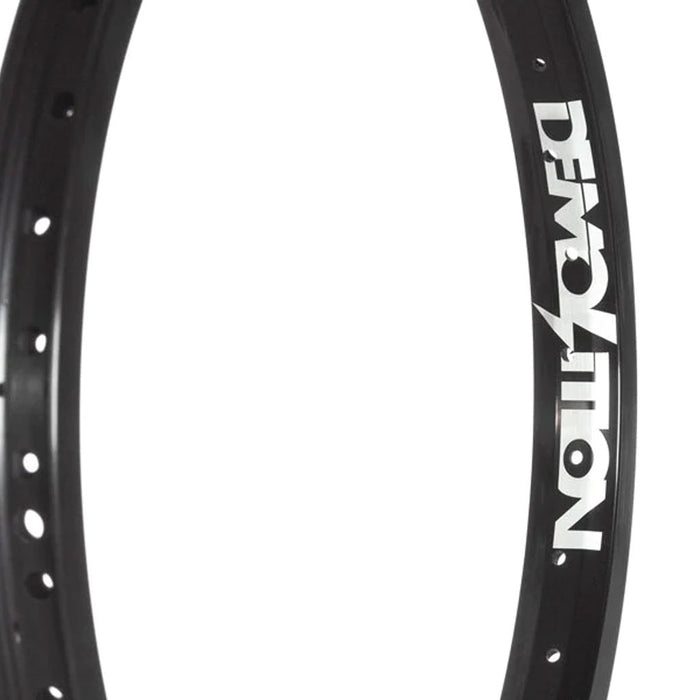 Mountain bike wheel rim with Demolition Zero Rim branding, featuring lightweight construction.