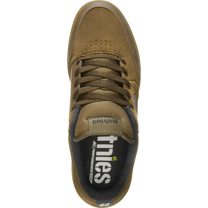 Explore the Etnies Marana Michelin Shoe in Brown/Black/Gum, an ideal choice for skateboarders. It incorporates a black and white logo on the insole, paired with textured fabric and laces, while the sole is made from Michelin performance rubber for superior durability and grip.