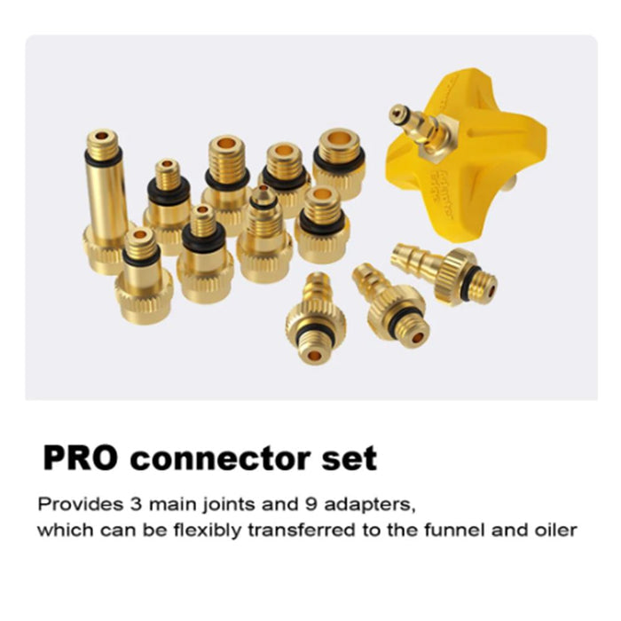 The EZ MTB Universal Bleed Kit - Workshop Model includes three main brass joints, nine adapters, and a yellow plastic piece for funnels and oilers, ideal for Shimano brake bleed or hydraulic disc brake maintenance.