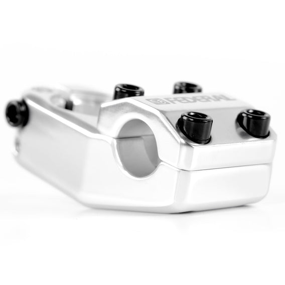 A close-up view of the Federal Element V2 Top Load Stem (22.2mm Clamp) in silver, expertly crafted from durable 6061 aluminium, featuring four black bolts and a prominent branding logo on top, photographed against a white background.