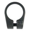 The Federal Investment Cast Seat Clamp is a black, circular seat clamp featuring an embossed front logo and a threaded screw at the base. Made from investment cast Chromoly, it offers exceptional strength and durability.