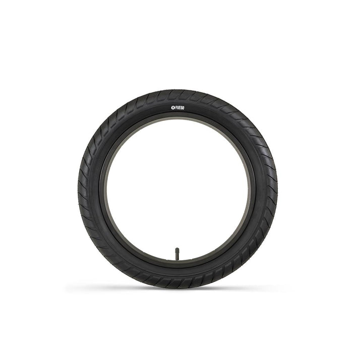 The Fly Bikes Fuego 18 Inch Tyre STD is shown against a plain white background, highlighting its visible valve and sidewall protection.