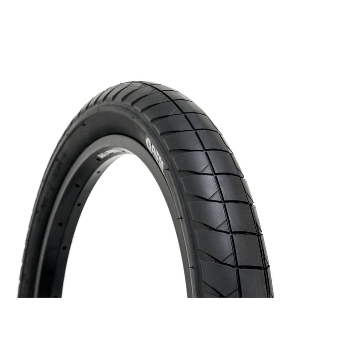 The Fly Bikes Fuego 18 Inch Tyre STD, with its smooth and textured tread pattern and sidewall protection for durability, is displayed against a plain white background.