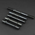 Four replacement Fly Bikes Magneto Female Front Axles on a black surface.