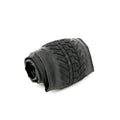 A Fly Bikes Ruben 20 Inch Tyre Ligera (Foldable) is shown rolled up with a textured tread pattern and a folding Kevlar bead for easy transport and enhanced durability, set against a plain white background.