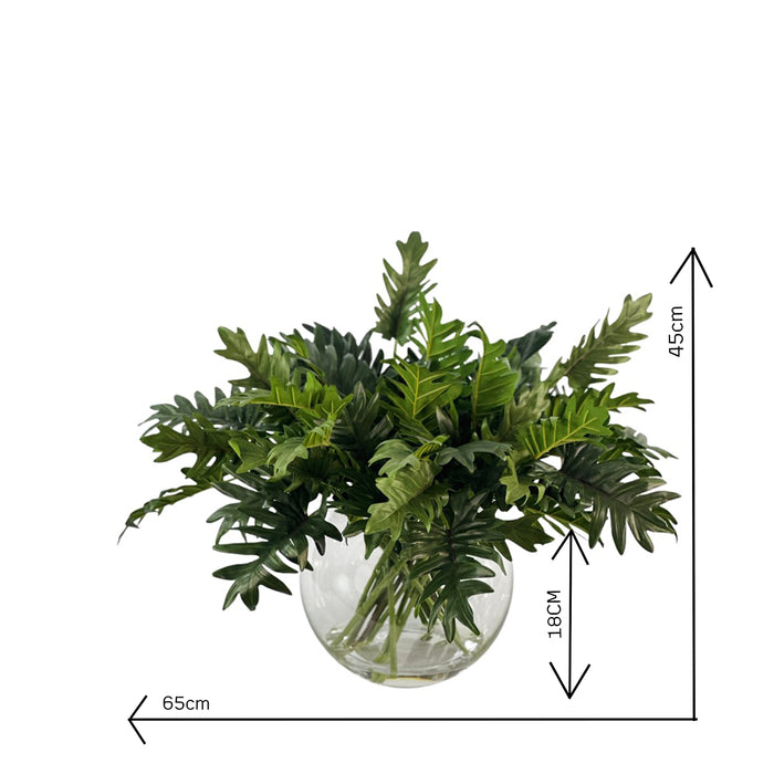 Green Philodendron Foliage in Glass Ball Vase