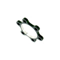 A black and green Meybo HSX Disk Spacer on a white background, inspired by Meybo.