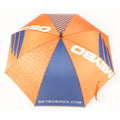 Blue and orange promotional Meybo Track Umbrella Black / Orange with "meybo" and "meybobikes.com" logos, viewed from above against a white background.