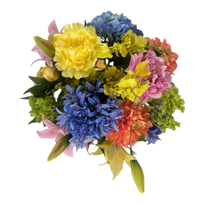 Mixed Agapanthus Peony and Lily Arrangement in a Glass Vase