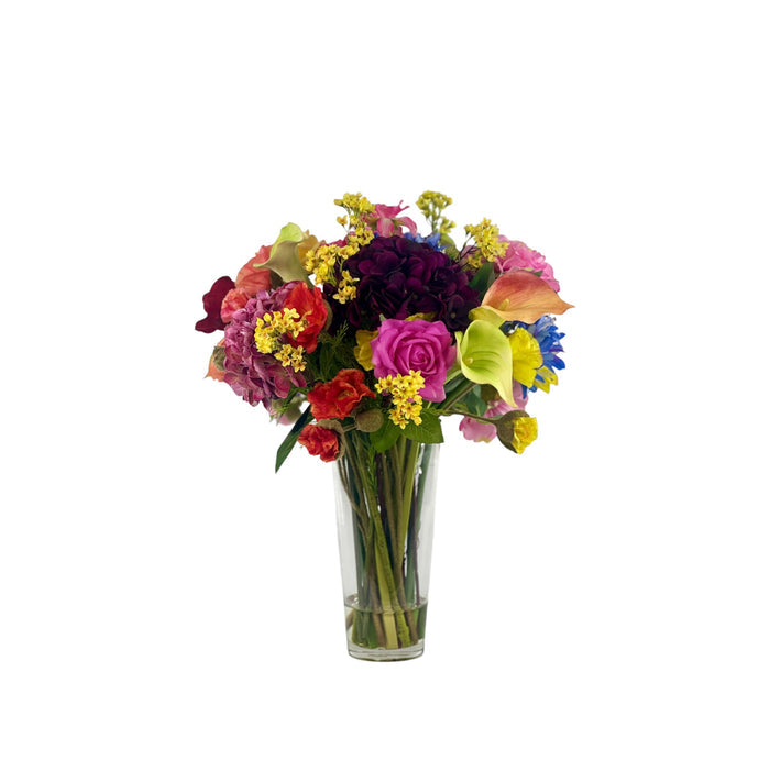 Mixed Hydrangea Poppy and Arum Lily Arrangement in a Glass Vase