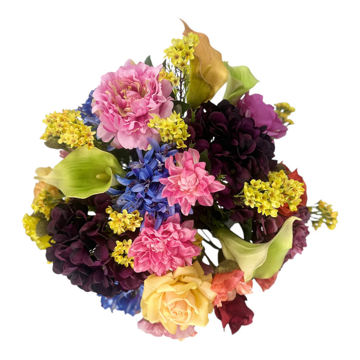 Mixed Hydrangea Poppy and Arum Lily Arrangement in a Glass Vase