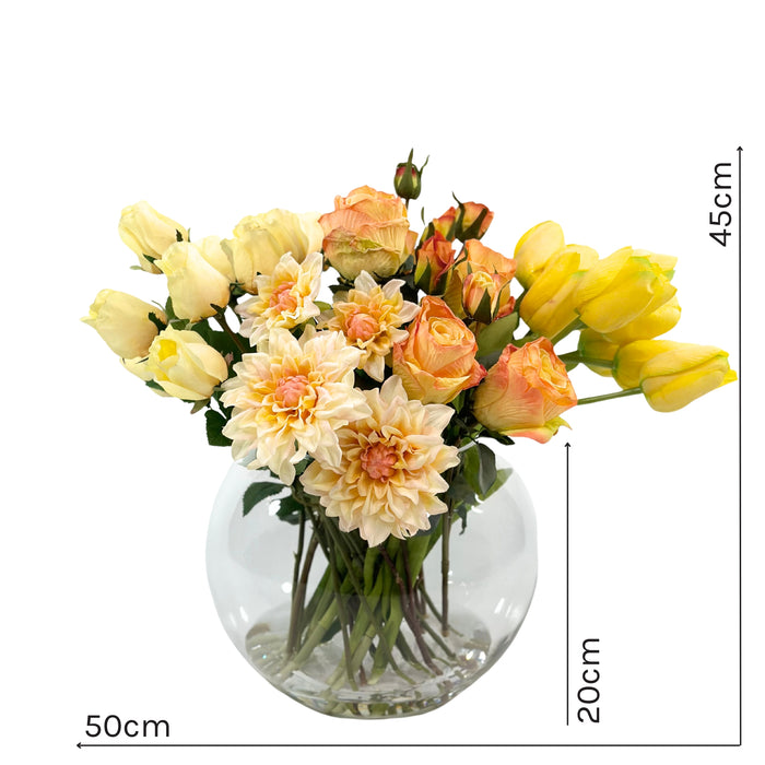 Mixed Peachy Yellow Tulip Dahlia and Rose in Fish Bowl Vase