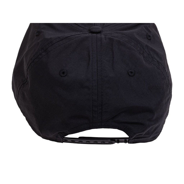 A black Odyssey Service Patch Cap viewed from the back, showcasing the adjustable strap with snap buttons—truly an Odyssey hat.