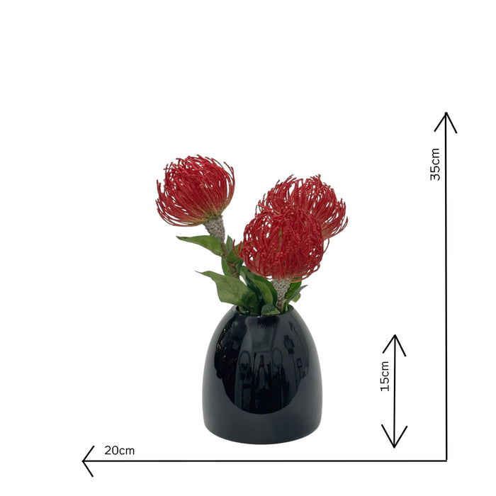 Fux Pincushions in Black vase on white background