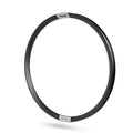 The PRIDE Helium Brakeless Expert Rim is a lightweight, black circular bicycle rim featuring a minimal design, expertly crafted from aluminium and displayed against a white background.