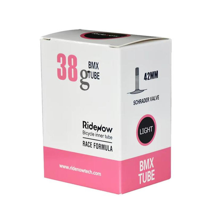 White and pink box labeled "RideNow TPU 20 Inch Tube Schrader Valve (Car Valve)," featuring "38g," "42MM Schrader valve," “Race Formula,” “Light” TPU inner tube, and “Bicycle inner tube” text.