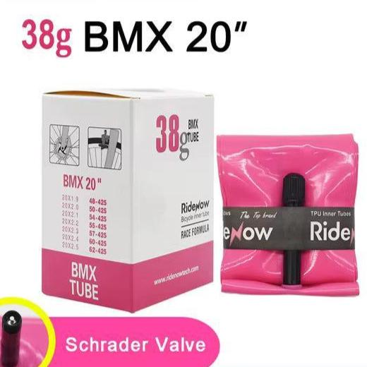 The RideNow TPU 20 Inch Tube with Schrader (car) valve is boxed and folded, weighs just 38g, features a race formula, and comes in pink—ideal for riders seeking ultra lightweight BMX inner tubes.
