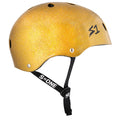 A yellow, glittery, hard-shell helmet with black adjustable straps and multiple ventilation holes. The S-One Helmet Mini Lifer Gold Gloss Glitter has "S1" printed on the side and features EPS Fusion Foam for enhanced protection as a multi-impact helmet.