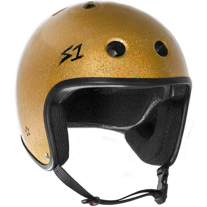 A S-One Helmet Retro Lifer Gold Gloss Glitter with ventilation holes, a black interior, and a chin strap, adorned with a black logo on the side. This multi-impact certified helmet features EPS Fusion Foam for superior protection and comfort.