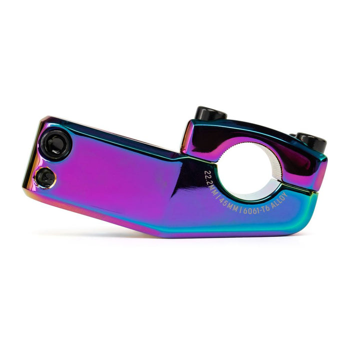 The Salt AM 45 Top Load Stem (22.2mm Clamp) is a metallic, rainbow-colored stem designed for 18-inch bikes, featuring Shark Tooth Clamping for a secure hold. It has two bolt holes on one end and a round clamp on the other, and is labeled “22.2MM x 48MM 6061-T6 ALLOY.”.