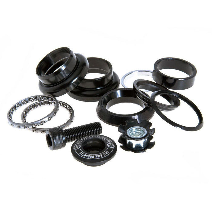A set of Salt AM Push In Headset 1 Inch and screws for a bicycle.