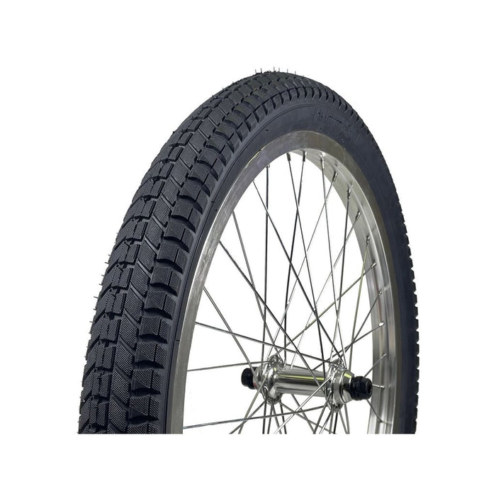 A close-up view of a bicycle tire with a black tread pattern mounted on a silver rim with visible spokes and hub, showcasing the durable S&M Mainline V2 20 Inch Tyre designed for trail use, complete with high pressure casings.