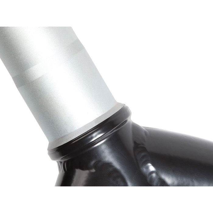 Close-up of the S&M Pitchfork XLT 14 Inch Fork, a black and metallic CNC-machined piece featuring smooth surfaces and a circular joint connection, crafted from high-quality 4130 CrMo for exceptional durability.