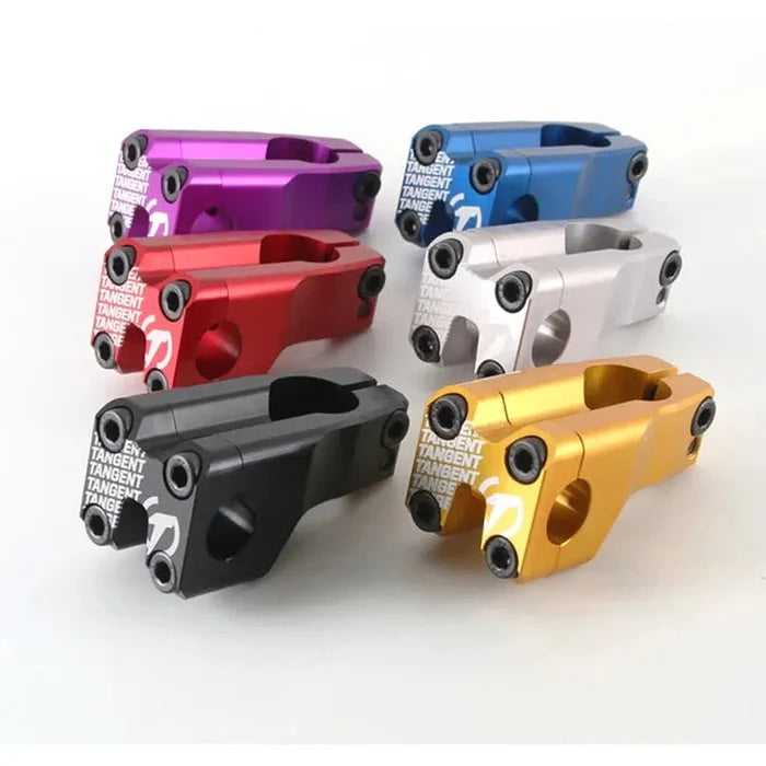 Eight Tangent Front Load Stems (22.2mm clamp) are arranged in two rows on a white surface; available colors include purple, blue, red, silver, black, and gold. Each front load stem features bold white Tangent branding, making them standout BMX components.