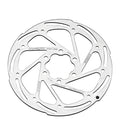 A close-up of a silver TRP Slotted Disc Brake Rotor with multiple cutouts and text indicating specifications such as "140-1.8mm" along with the 6-bolt ISO mounting pattern.