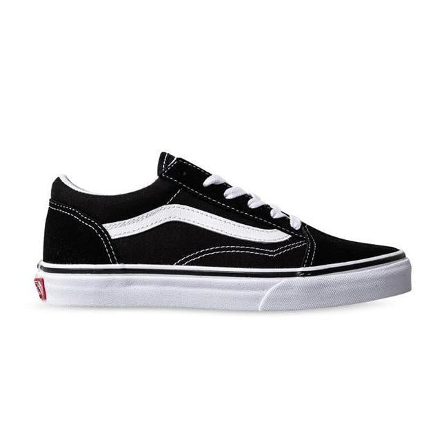 The Vans Kids Old Skool Black/White skate shoe features white laces, white stitching, and a white rubber sole—ideal for kids' everyday style.